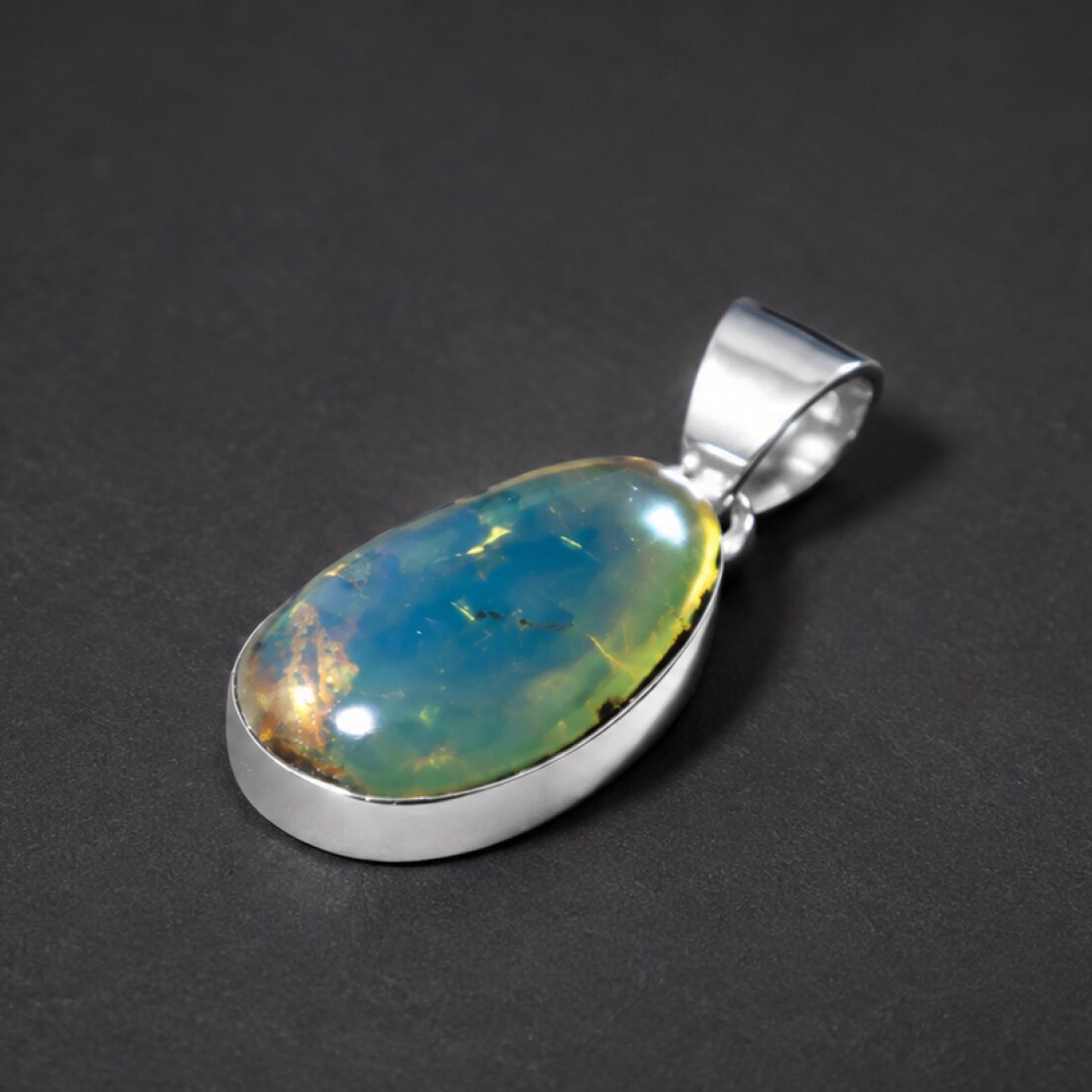 Handcrafted Excellence Clear Sky Blue 925 Sterling Silver Dominican Amber Pendant