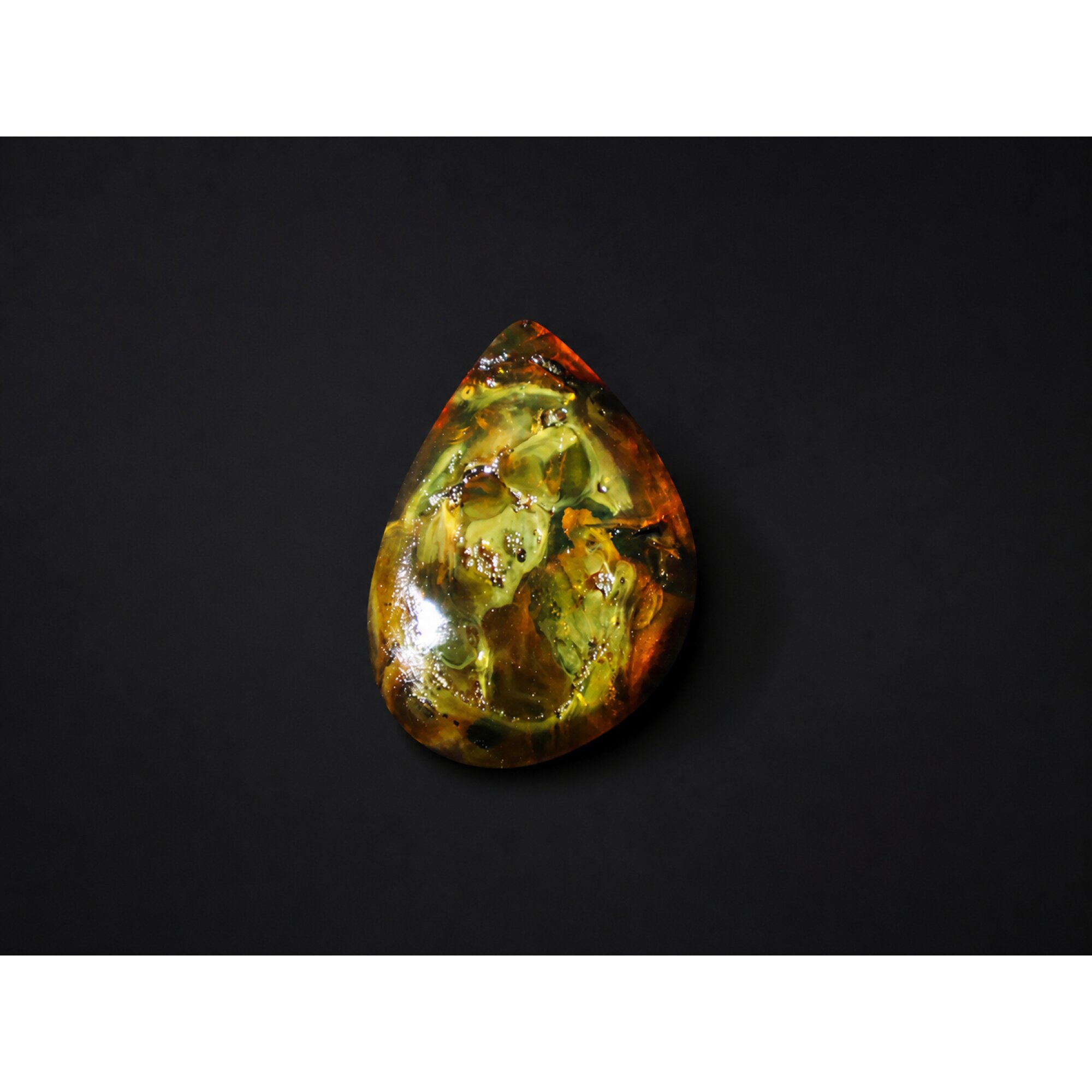 Translucent yellow orange Natural Dominican Amber teardrop Polished Stone 26 mm – photo 2