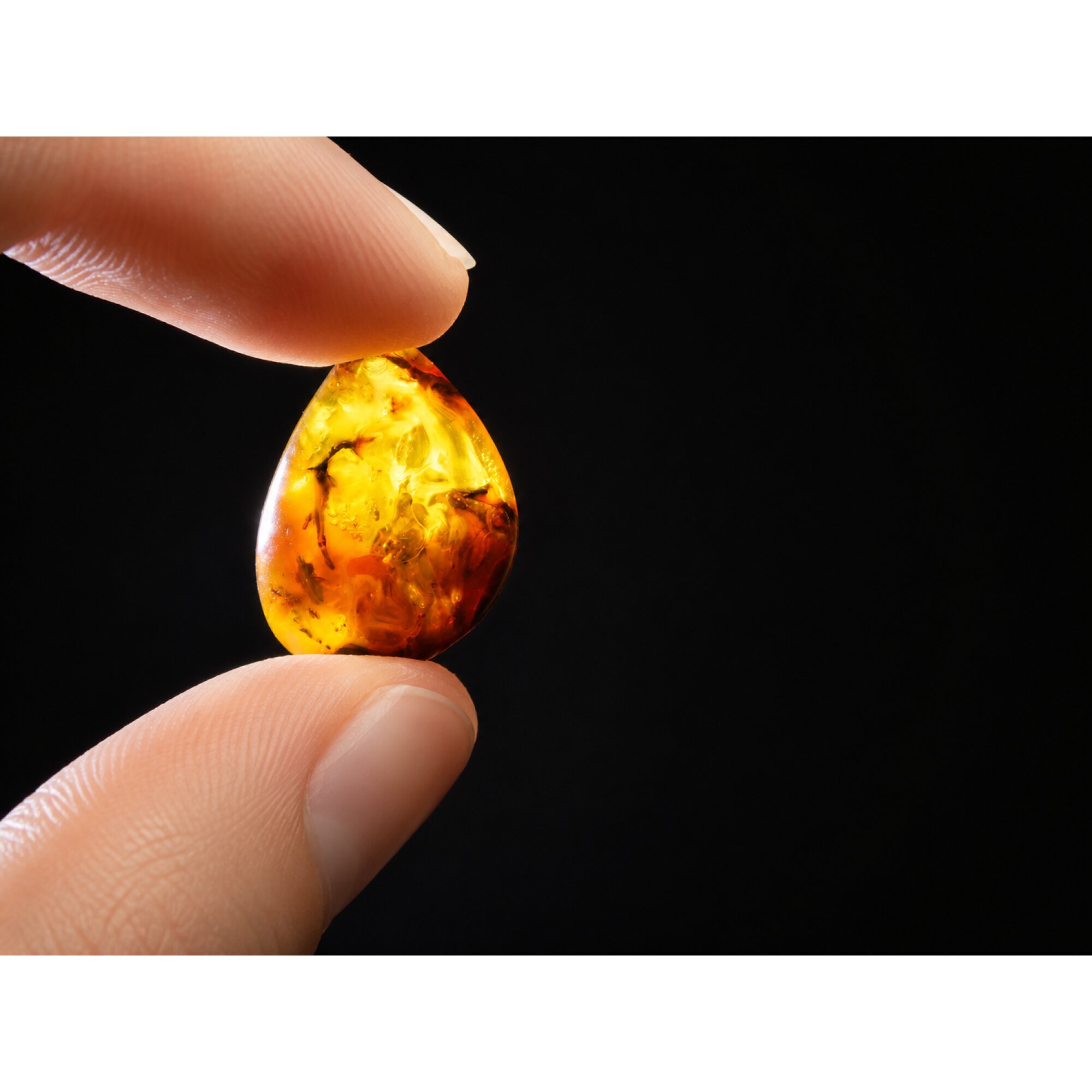 Translucent yellow orange Natural Dominican Amber teardrop Polished Stone 26 mm – photo 7