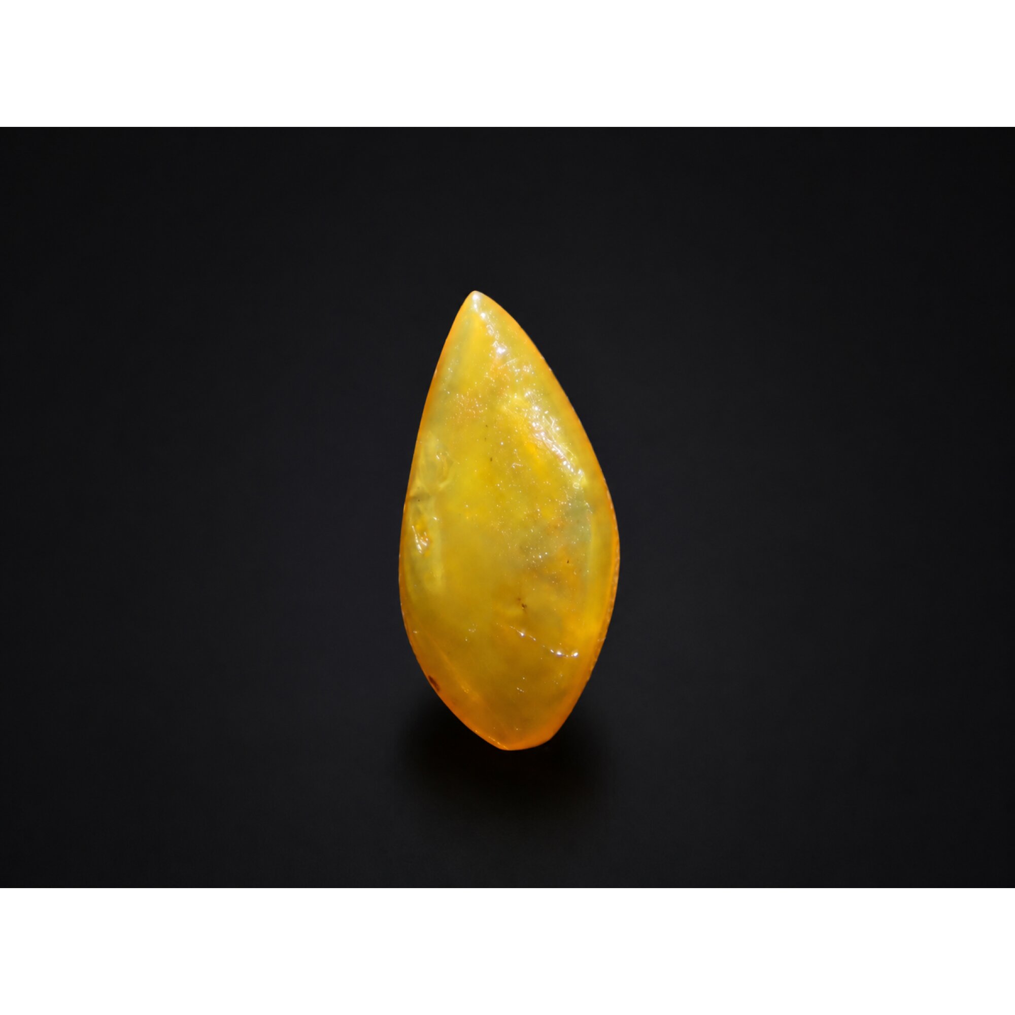 Translucent eggyolk yellow Natural Dominican Amber teardrop Polished Stone 26 mm – photo 2