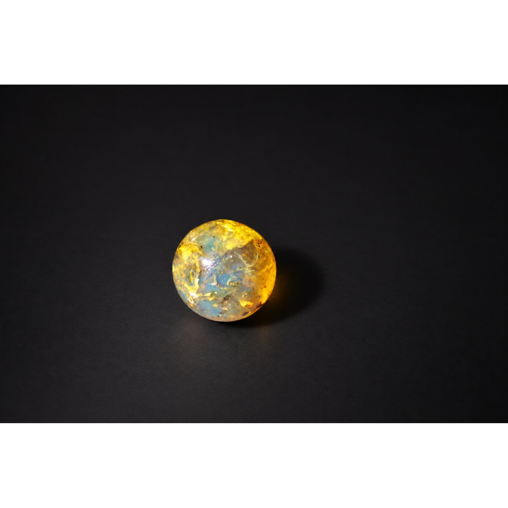 Natural yellow blue Dominican amber sphere/ball 21mm – photo 3