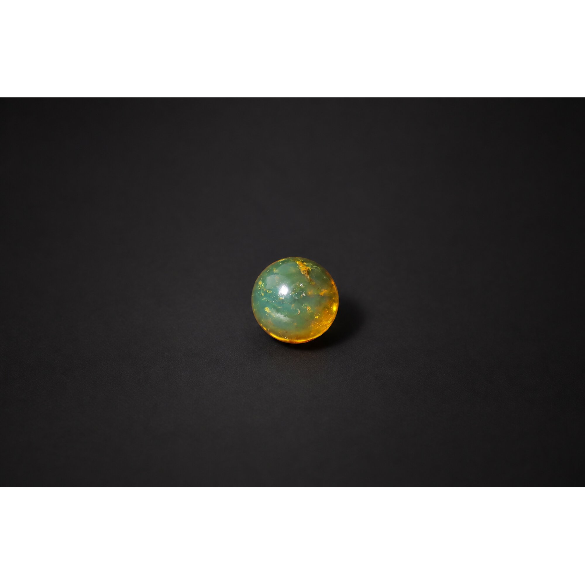 Earth mined yellow blue Dominican amber sphere/ball 17.6mm – photo 7
