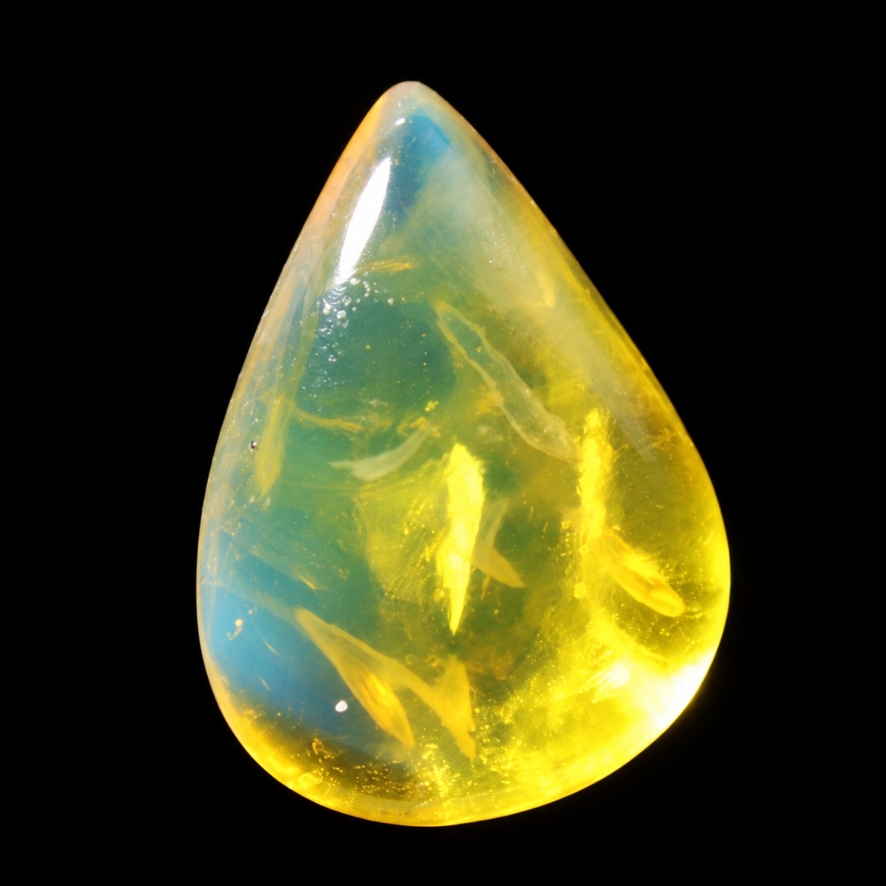 Earth crafted blue green polished Dominican amber
