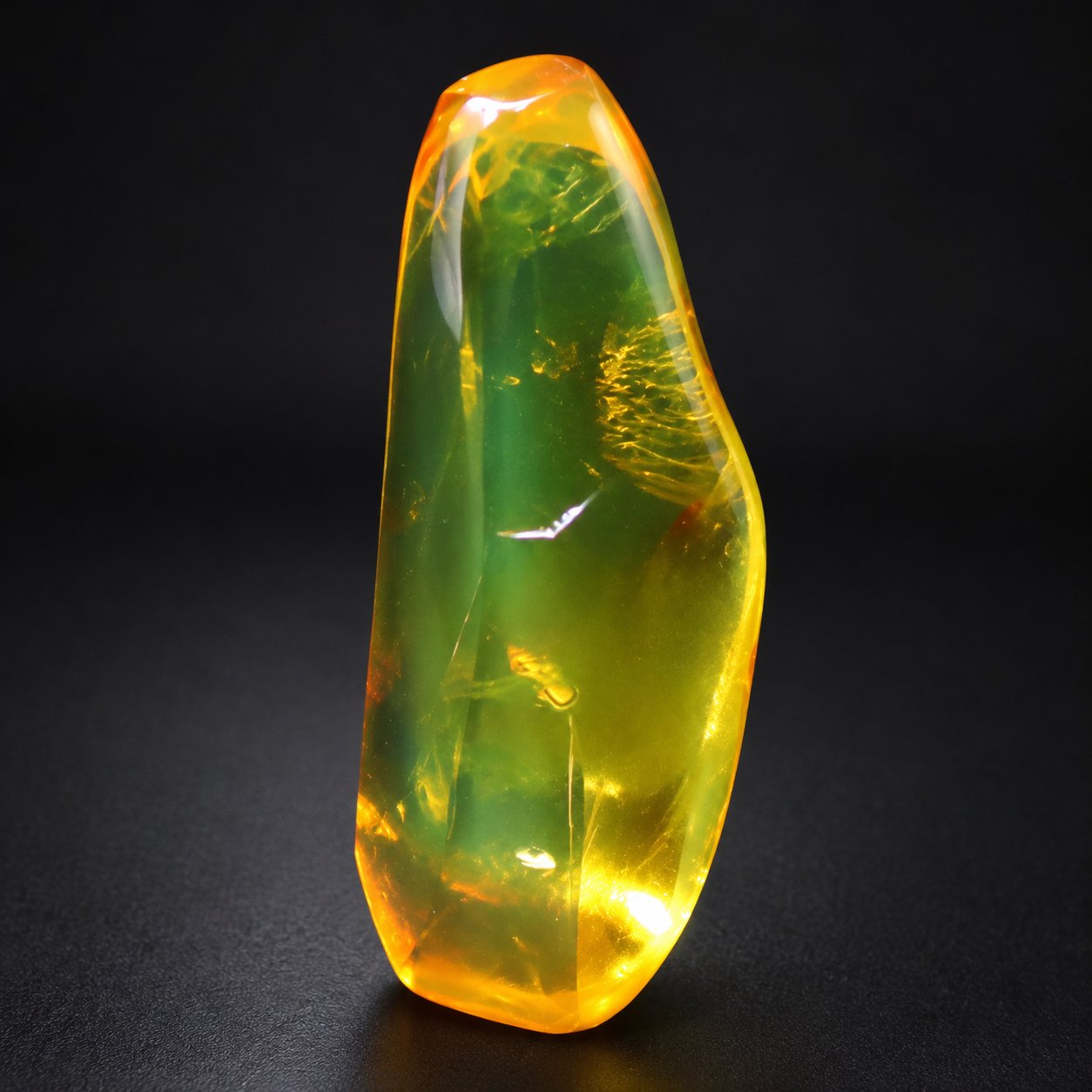 True caribbean deep green polished Dominican amber – photo 6